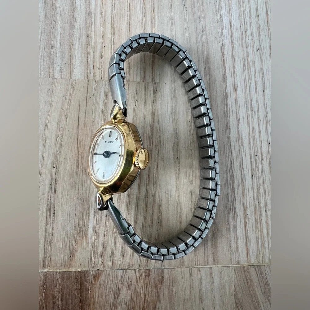 Vintage Timex ladies oval two toned mechanical winding dress watch